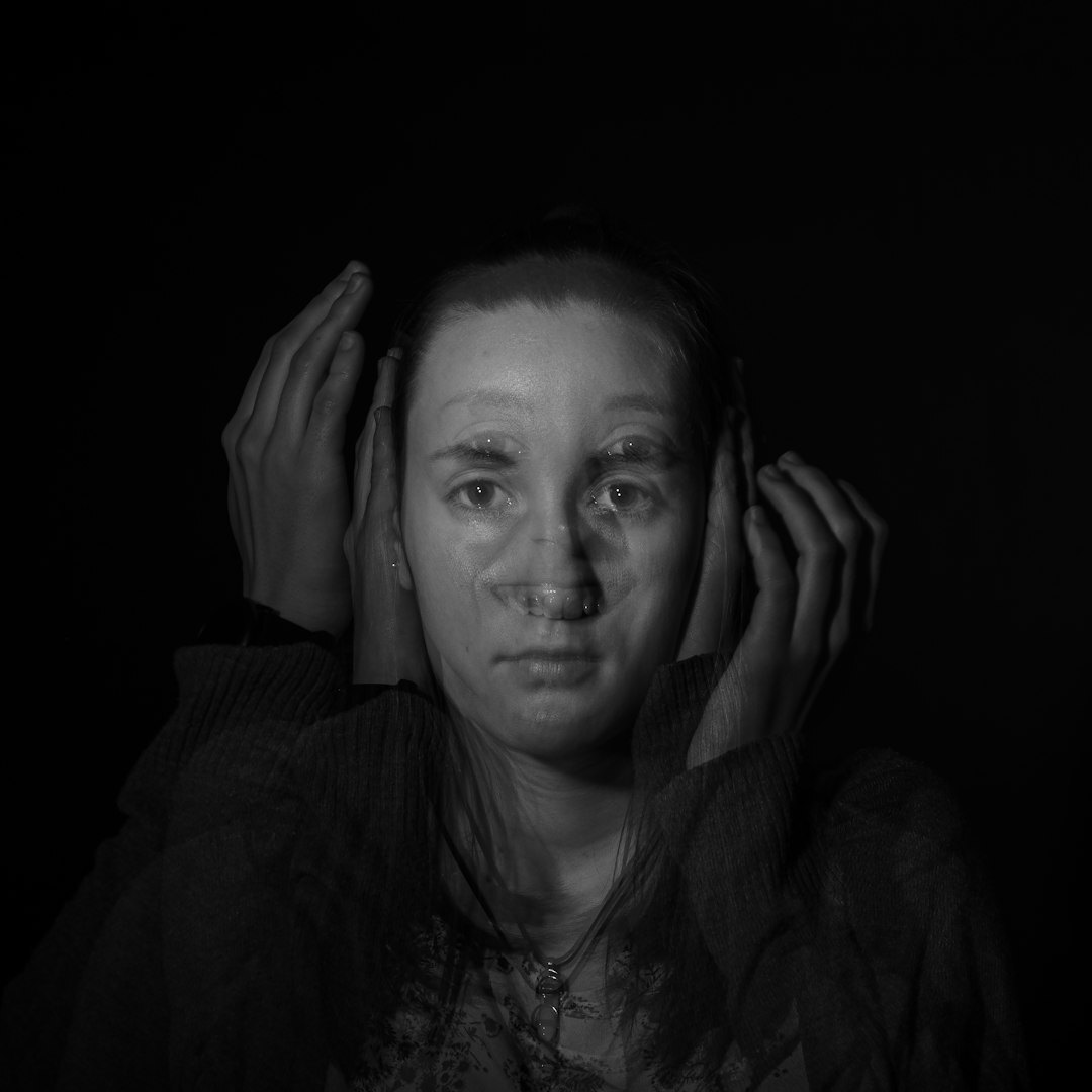 Studio portrait of a woman sound designer wearing headphones
